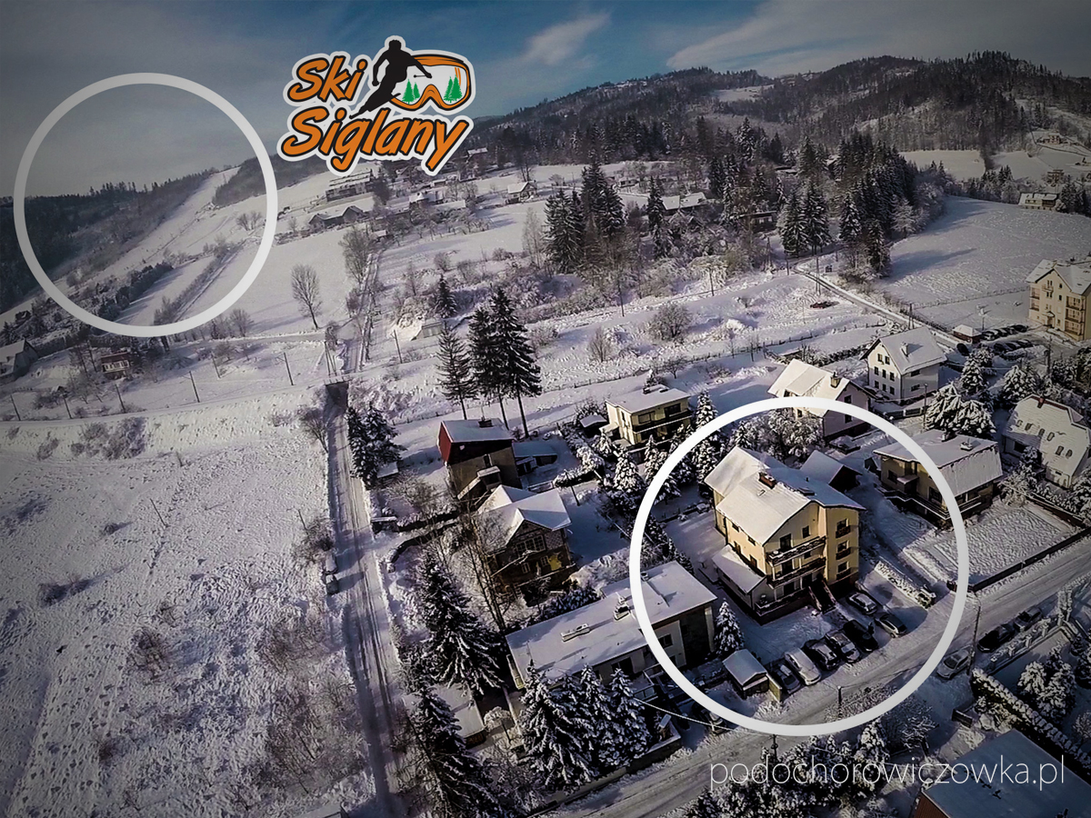 Zimowy widok z lotu ptaka na Rezydencję Pod Ochorowiczówką B&B i pobliską Stację Narciarską Siglany w Wiśle